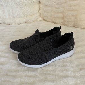 Sketchers slip on sneakers.